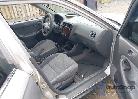 1999 Honda Civic Lx from USA, damaged, VIN 1HGEJ6571XL042988